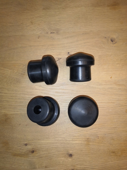 Rubber buffer for the front axle
